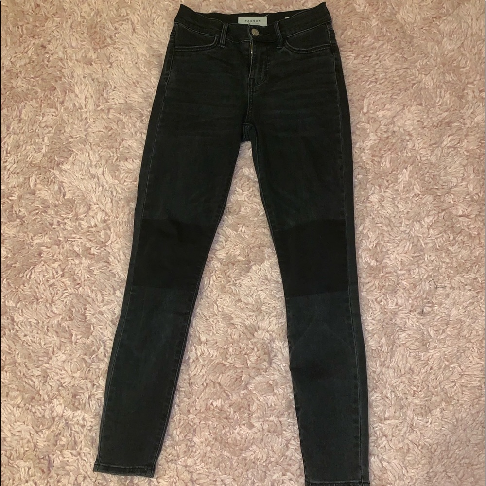 high rise grey jeggings with black patch on knee
